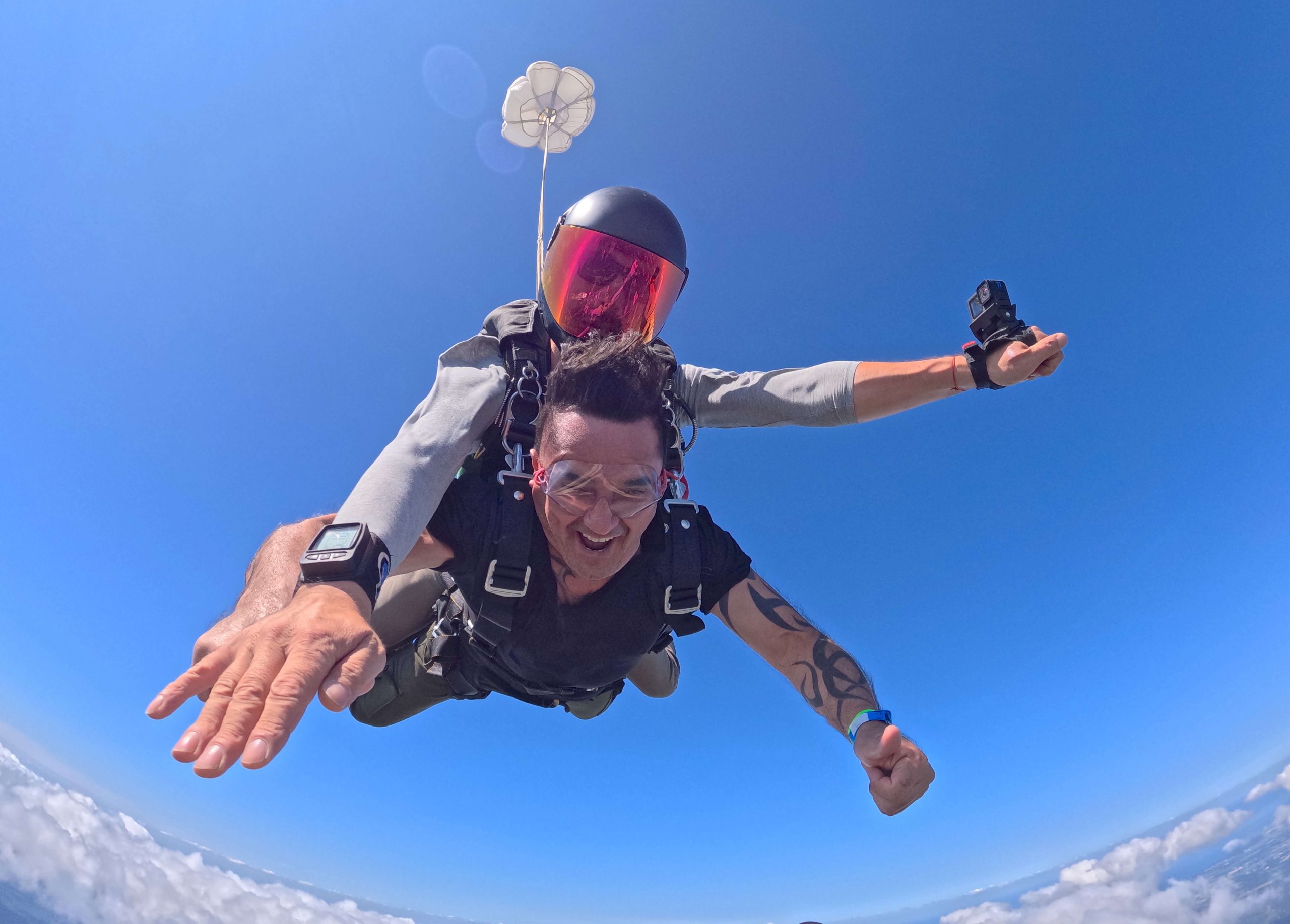 Gentleman skydiving above the New York coast