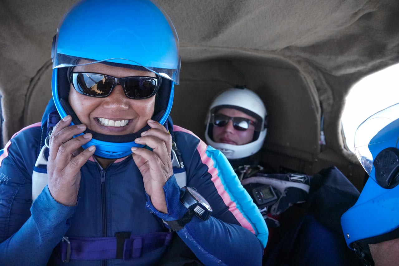 Why do skydivers wear helmets
