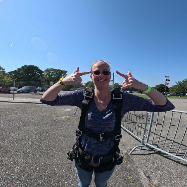 Woman skydiver getting ready to skydive