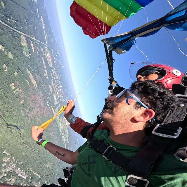 Flying under canopy after freefalling above New York.